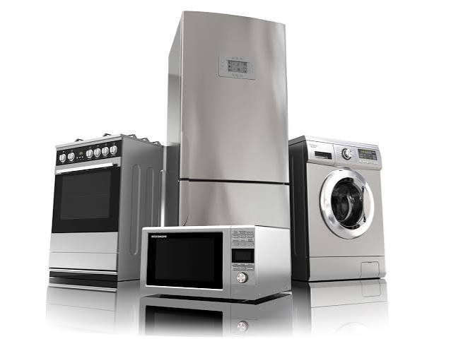 Household appliances including an oven, refrigerator, and washing machine